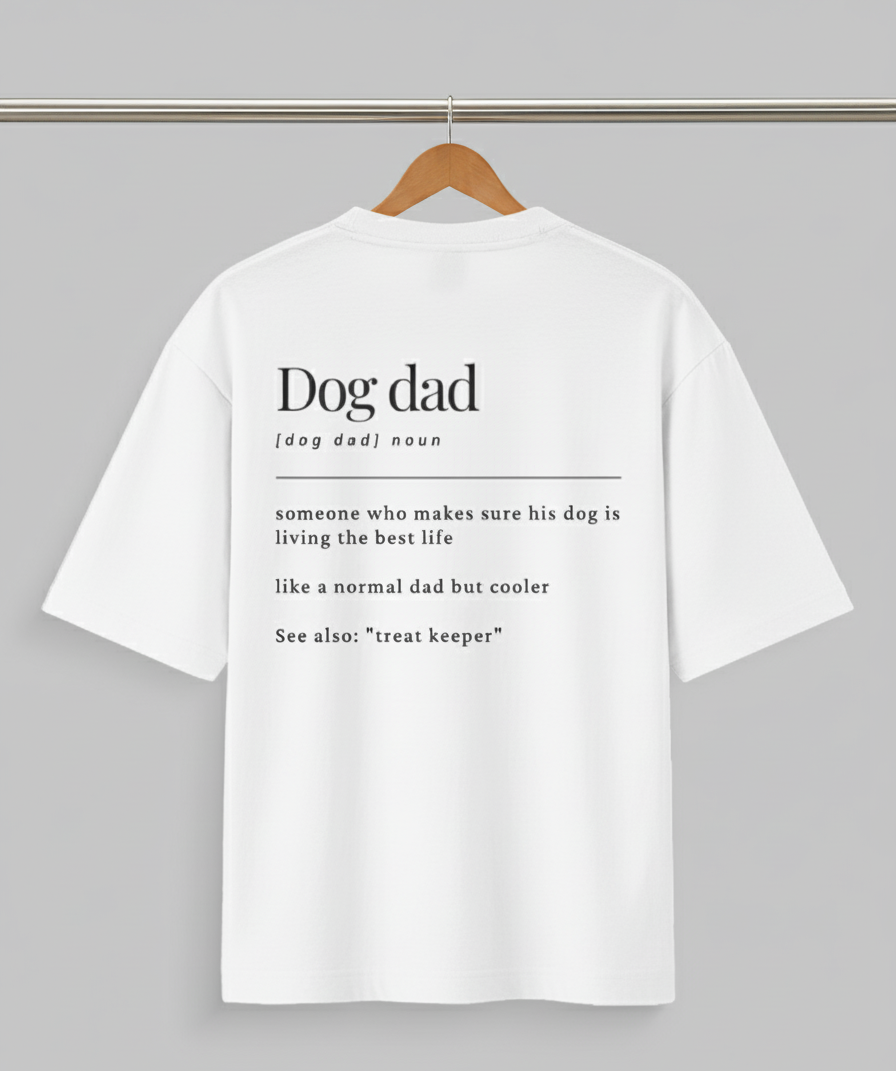 White t-shirt with text on a hanger against a gray background